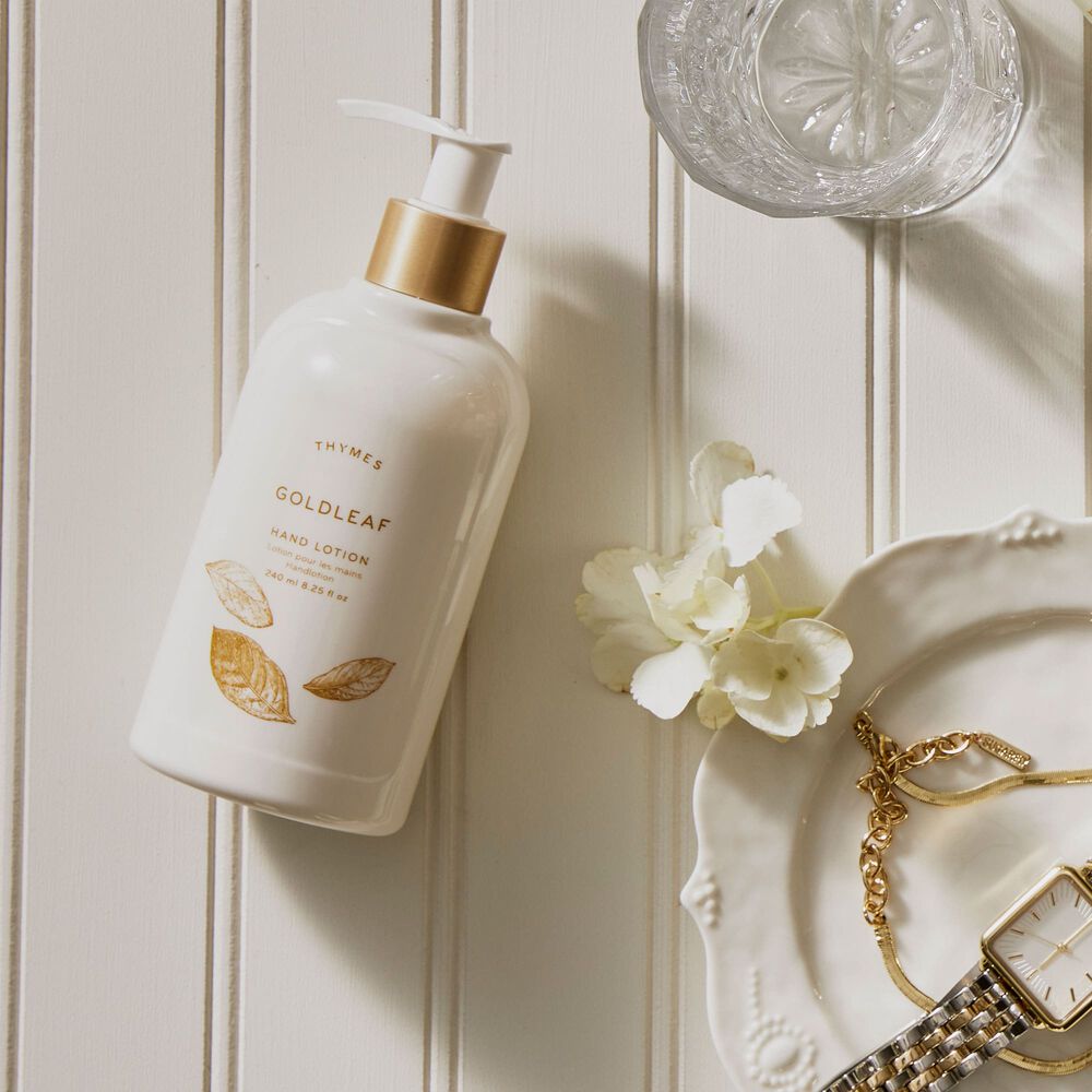 Thymes Goldleaf Hand Lotion on countertop image number 1